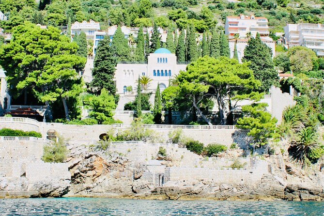 50-minute Panoramic Cruise of Dubrovnik with English Audio Guide - Hotel Belvedere and a quieter side of the coast
