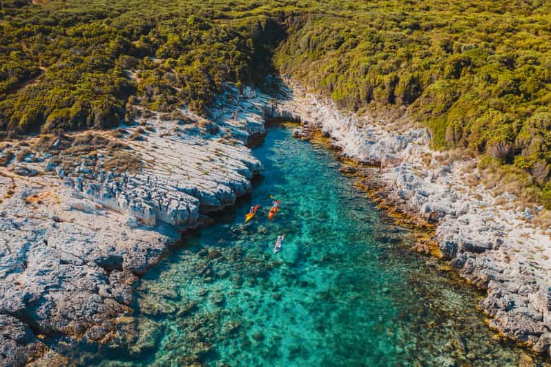 Cape Kamenjak: Cave and Safari Experience by Kayak - Snorkeling beneath a 15-meter cliff