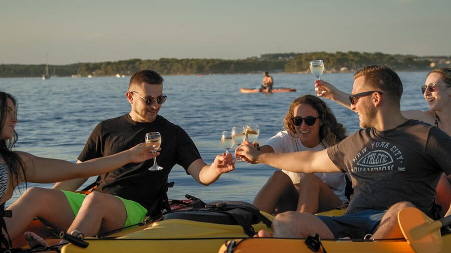 Cape Kamenjak: Sunset Kayak/SUP Wine Tour - Reaching Ceja island