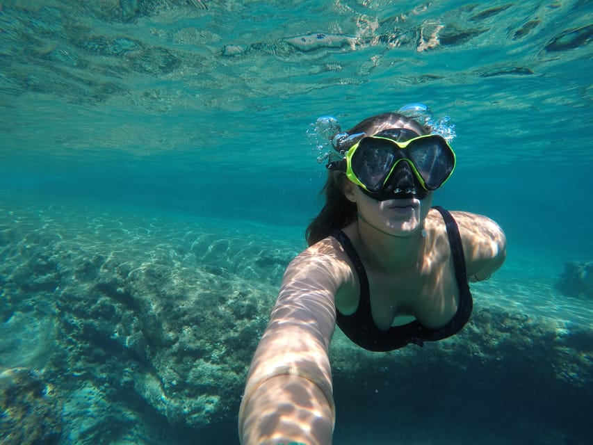 Cape Kamenjak: Sunset Kayak/SUP Wine Tour - Swimming and snorkeling in the blue water