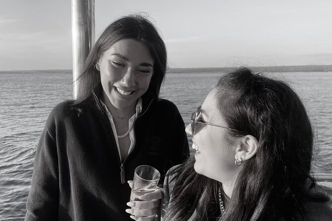 Dolphin Watching & Sunset Boat Tour With Dinner and Drinks - Dinner, wine, and the sunset return