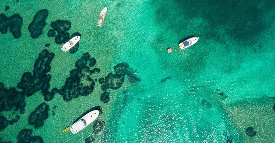 Dubrovnik: Blue & Green Caves Private Boat Tour with Drinks - Green Caves and the cliff-jumping stop