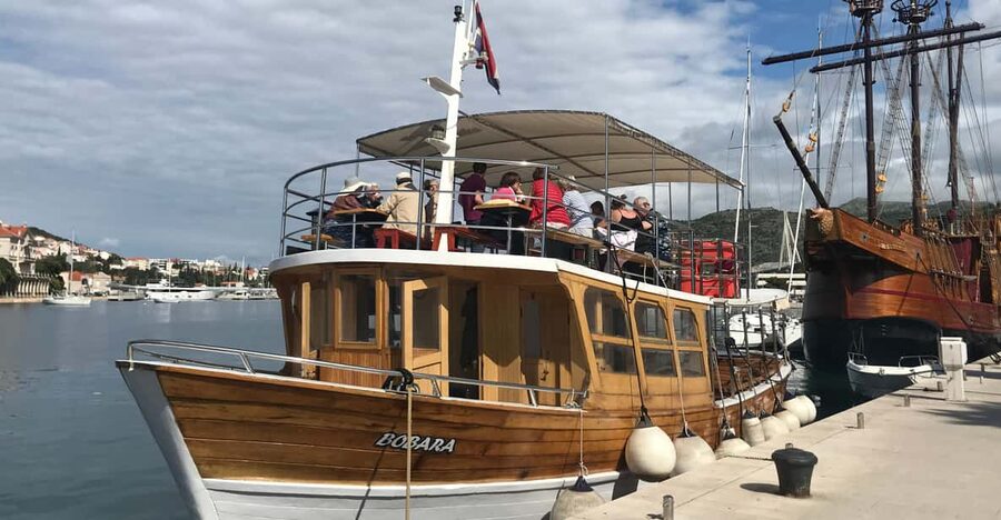 Dubrovnik: Elaphiti Islands Boat Cruise with Lunch & Drinks - Koločep gives you a short first look