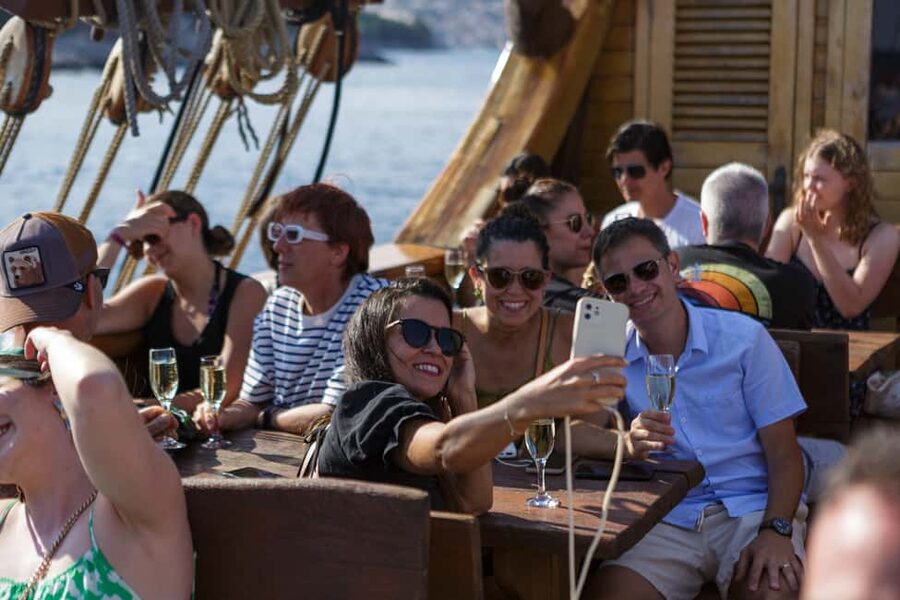 Dubrovnik: Galleon Sunset Cruise with a Live Guide & Drink - Following the Old Town walls from the sea