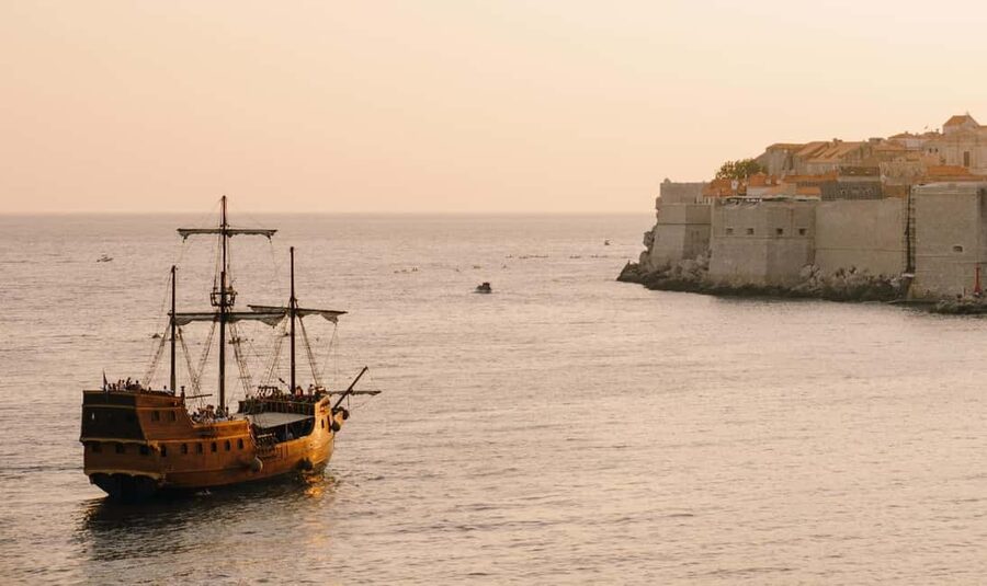 Dubrovnik: Galleon Sunset Cruise with a Live Guide & Drink - The welcome drink and first views of Dubrovnik