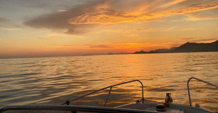 Dubrovnik: Romantic Sunset Cruise - Along the walls, beaches, and coastal buildings