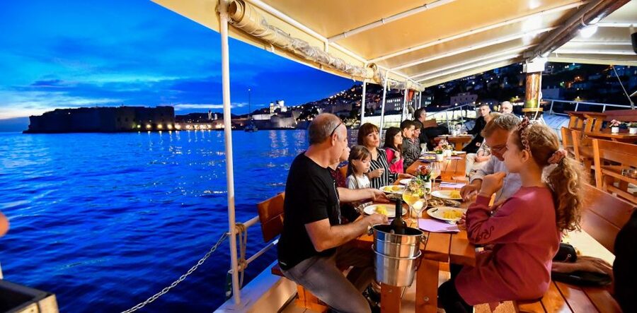 Dubrovnik: Sunset Dinner Cruise around the Old Town - Sunset, candles, and the best part of the evening