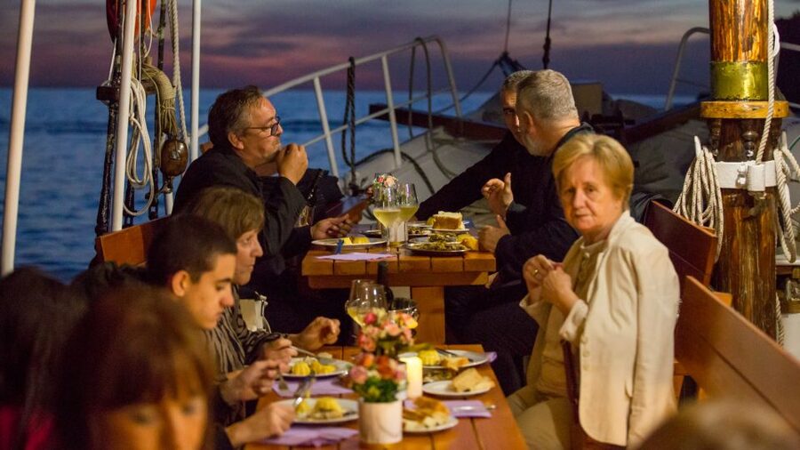 Dubrovnik: Sunset Dinner Cruise around the Old Town - A traditional Croatian dinner cooked aboard