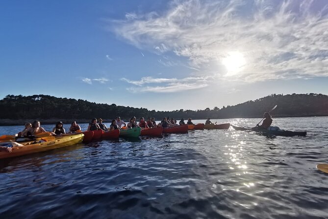 Dubrovnik: Sunset Kayak & Snorkel Tour with Wine & Water - Betina Cave beach and the snorkeling break