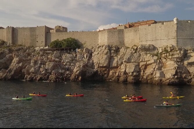 Dubrovnik: Sunset Kayaking & Snorkeling with water &wine - Sunset on the return route