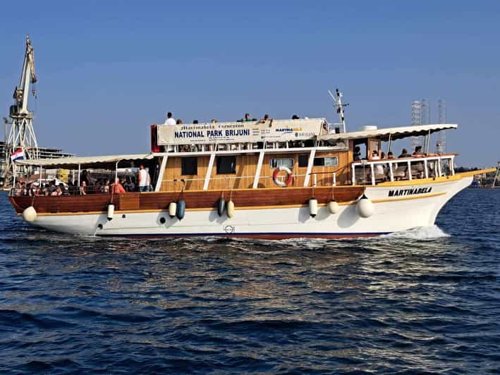 From Fazana: Dolphin watching sightseeing cruise at sunset - Brijuni National Park from the water