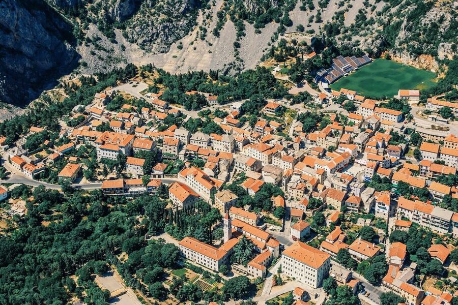 From Sinj: Flight Over Imotski, Trilj, Omiš, and Split - Omiš, where the canyon reaches the sea