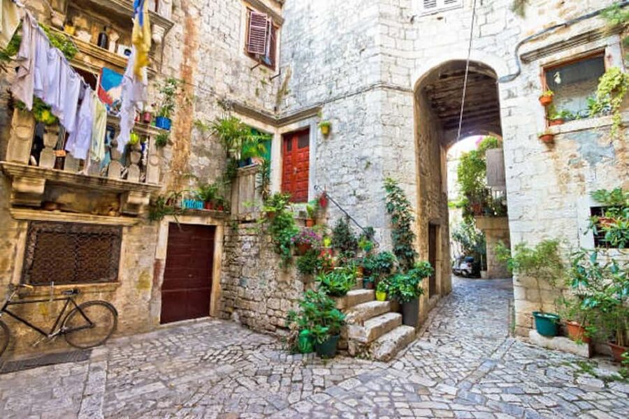 From Split: Blue Lagoon, Šolta, and Trogir Speedboat Tour - A small boat ride with a big coastal view