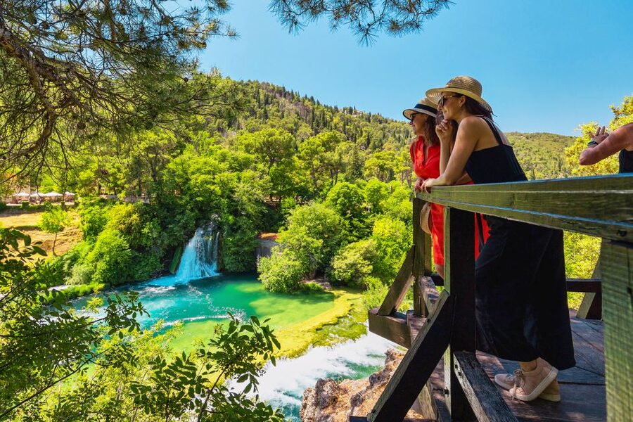 From Split: Krka National Park Tour - Arriving at Skradinski Buk by boat