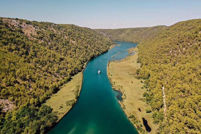 From Split: Krka Waterfalls Tour, Boat Cruise & Swimming - The boat cruise between the park and Skradin
