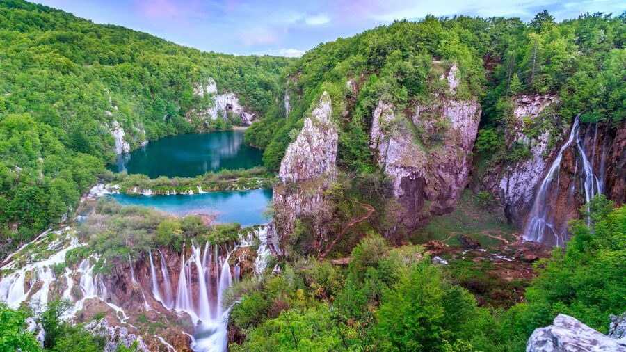 From Split/Trogir/Omiš: Plitvice Lakes Guided Group Tour - The boat cruise across the lakes