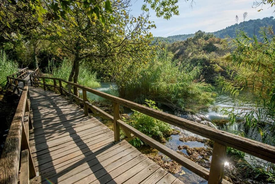 From Trogir, Seget & Okrug: Krka Waterfalls Culture Tour - Primošten brings the day back to the coast