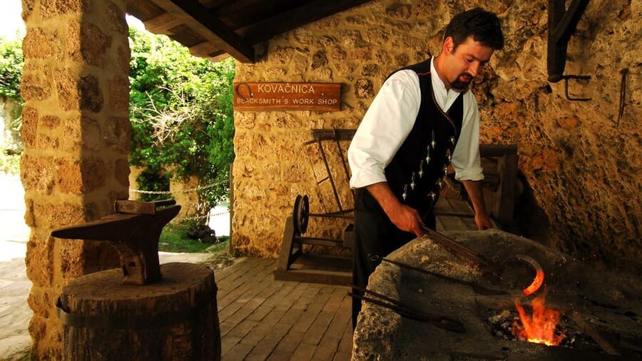 From Trogir, Seget & Okrug: Krka Waterfalls Gastro Tour - A calm boat ride down the Krka River