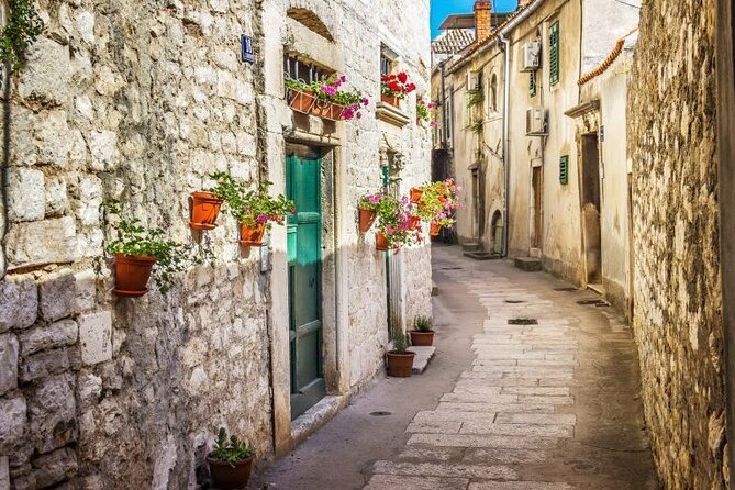 From Trogir, Seget, Okrug: Krka Waterfalls & Šibenik Culture Tour - Skradin, one hour beside the water