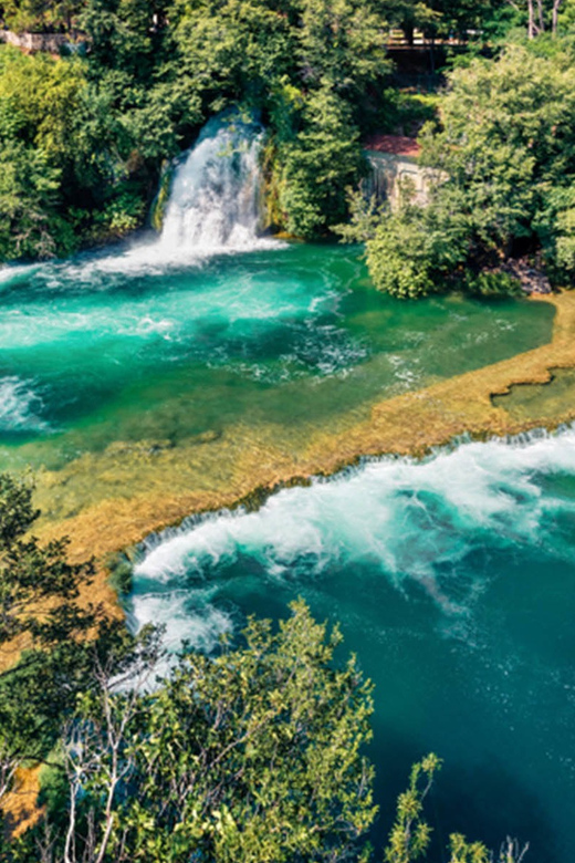 From Trogir, Seget & Okrug: Krka Waterfalls & Swimming - The boat from the waterfalls to Skradin