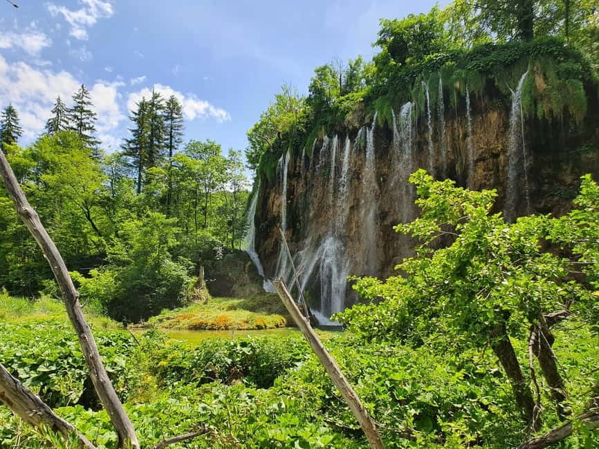 From Zagreb: Rastoke and Plitvice lakes Guided Day Trip - The boat and train rides inside the park