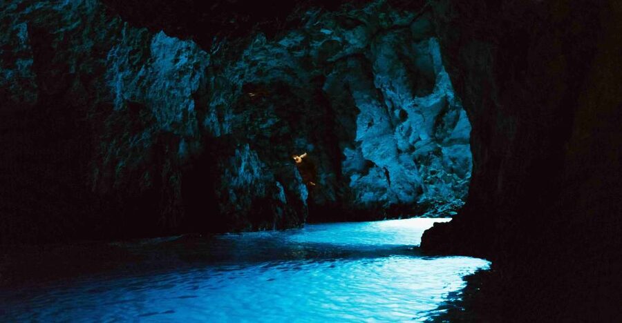 Hvar: Blue and Green Caves Boat Tour with Stiniva Beach - The Blue Cave, the star attraction with a practical warning