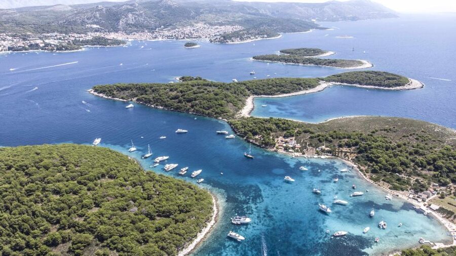 Hvar: Blue Cave, Green Cave & Stiniva Beach Speed Boat Tour - Stiniva Cove beneath the cliffs