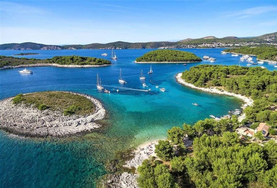 Hvar: Private Sailing Boat Trip with Swimming and Snorkeling - Sailing away from Hvar on a boat made for six