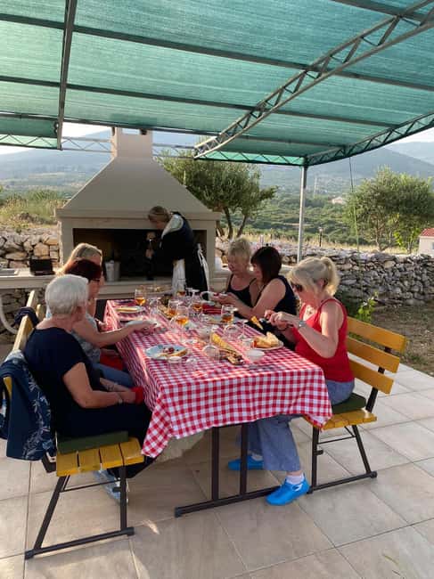 Kastela: Wine & Olive Tasting Tour w/Delicacies & Live Music - Accordion music and folklore dress make the visit personal