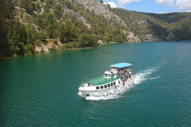 Krka Waterfalls Day Tour with Boat Ride from Split and Trogir - Skradinski Buk: waterfalls, mills, and wooden paths