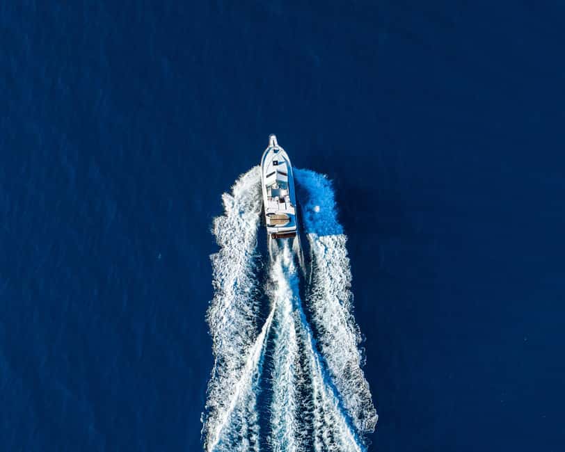 Lovran/Opatija: Swimming on Cres Island with Lunch - Brseč’s 60-meter cliffs from the water