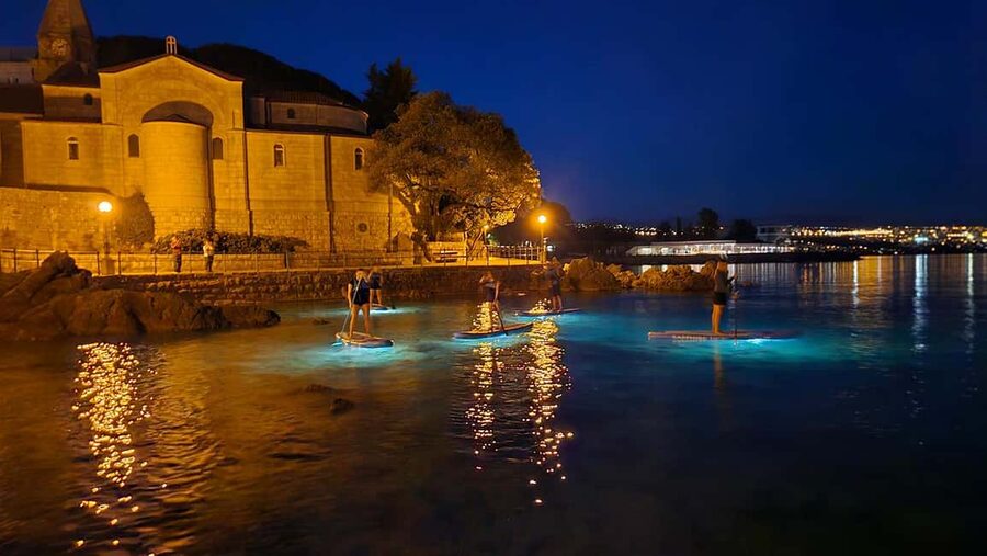 Opatija: Guided SUP Paddleboarding Adventure at Night - Learning the board before sunset fades