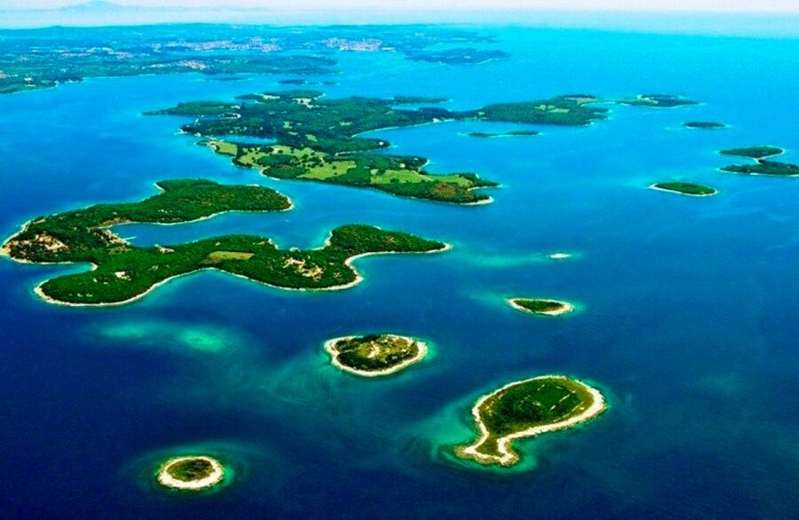 Pula: Brijuni National Park Tour with Island Visit - Boarding the traditional boat and finding your place