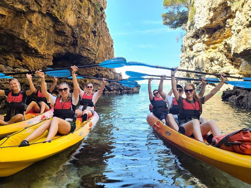 Pula: Cave Kayak Tour, Snorkeling and Island Jumping - The paddle along Pula’s rocky coast