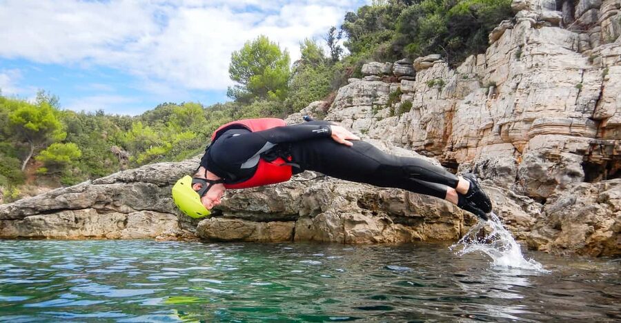 Pula: Coasteering Adventure with Guide and Photos - Sea caves, tunnels, and a small canyon