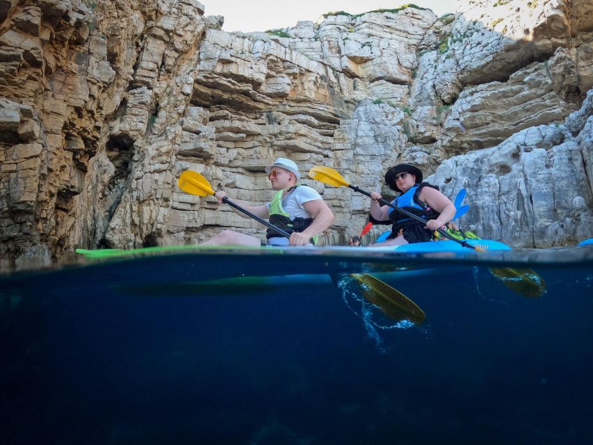Pula: Kayaking,Snorkeling, Cliff jumping Tour with Wetsuit - First coastal stop: swimming and snorkeling