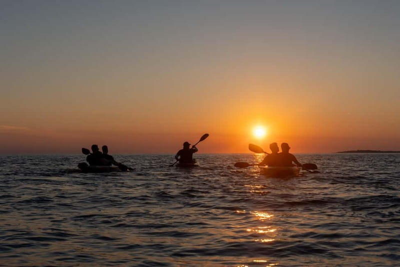 Pula:Sunset Kayak tour with glowing transparent kayak - A Different Way to See Pula’s Coast