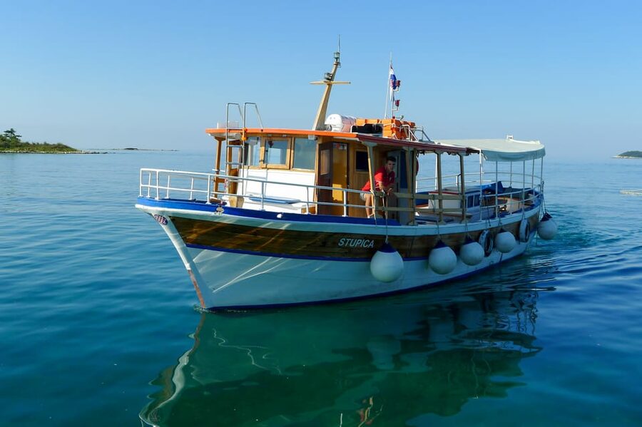 Rovinj: Sunset Cruise with Swim Stop, Drinks, and Fruits - Who should book this outing?