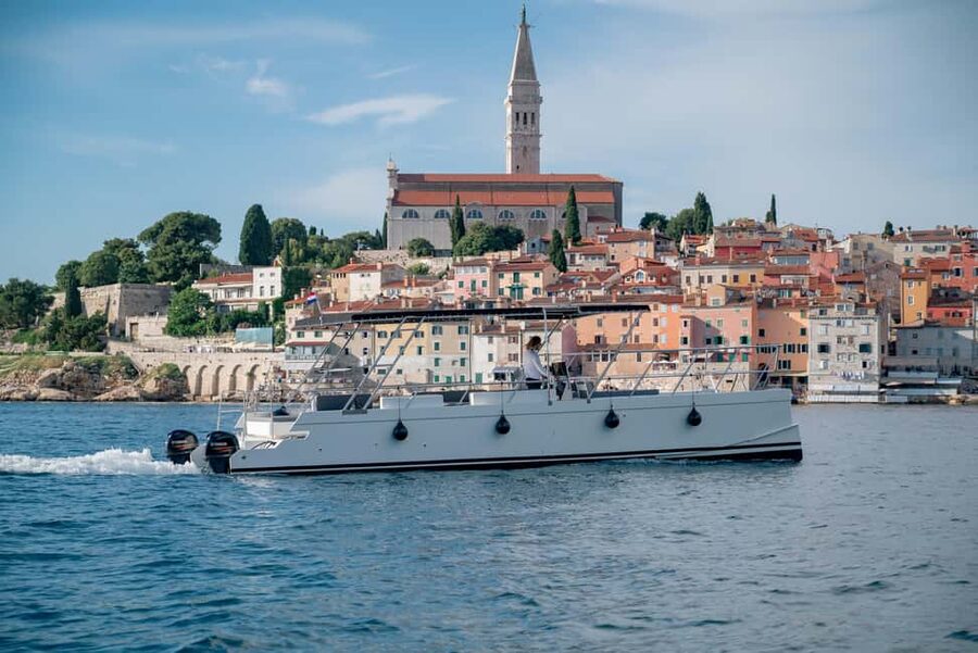 Rovinj: Sunset & dolphin group tours with Catamaran - Setting out for the Rovinj waterfront