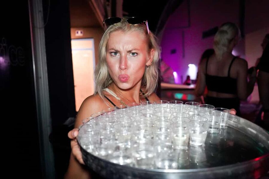 Split: Boat Crawl with Nightclub Access, Shots, & Boat Party - Moving through three venues before the club