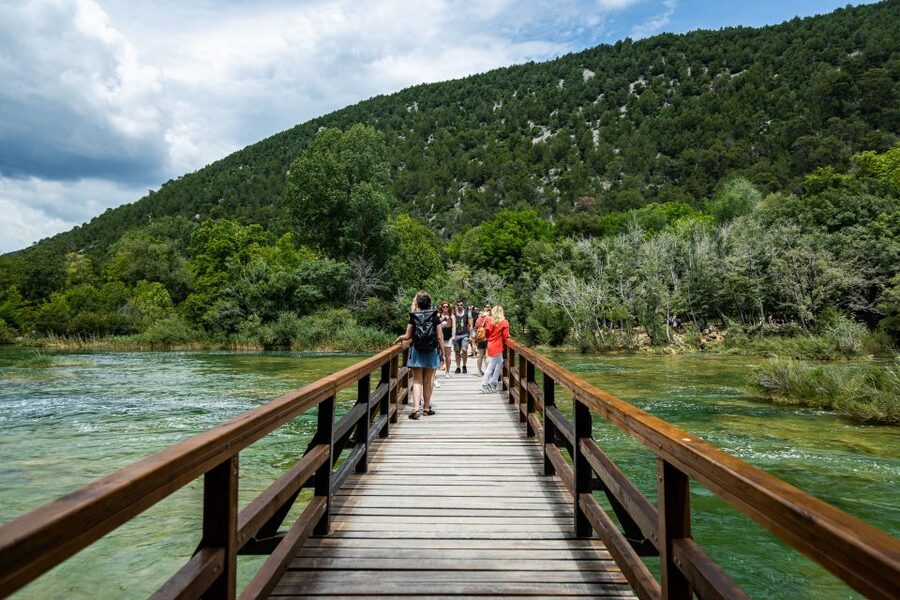 Split: Krka National Park Day Trip with Boat Ride & Swimming - Walking Krka National Park’s waterfall trails