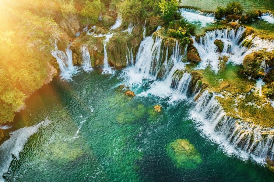 Split: Krka Waterfalls Trip with Boat Cruise and Swimming - The Coastal Ride Back to Split