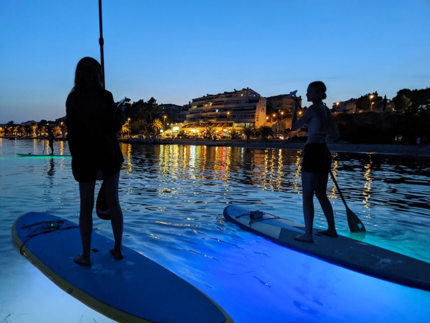 Split: Stand Up Paddleboard Night Glow Tour - Paddling through the evening sea