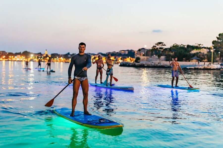 Split: Stand Up Paddleboard Night Glow Tour - Swimming, photos, and the social side