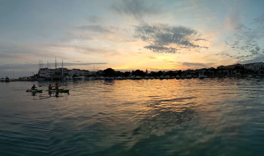 Split: Sunset Guided Kayaking Tour - Open water, cliffs, and old houses