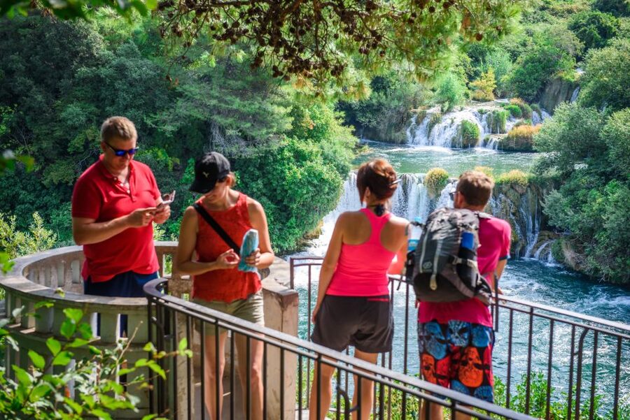 Split/Trogir: Krka National Park Day Trip with Wine Tasting - Walking the wooden paths at Skradinski Buk
