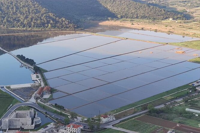 Ston Tour: City Walls, Saltworks, Wine & Adriatic Seafood - An oyster farm by boat in Mali Ston Bay