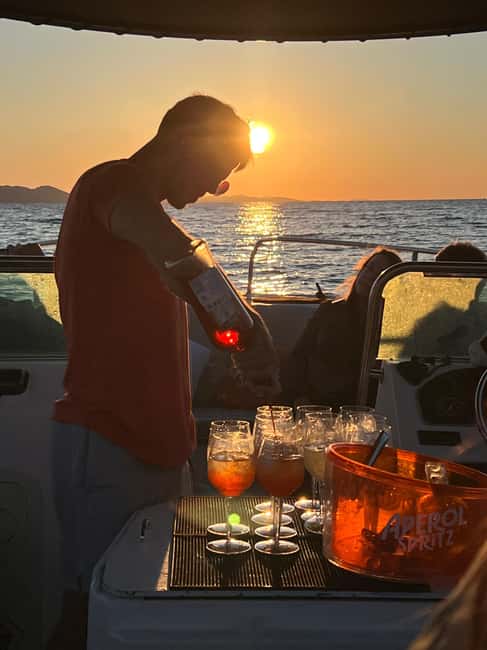 Zadar: Sunset Boat Tour with Aperol Spritz - The ride back to Foša with music and city lights
